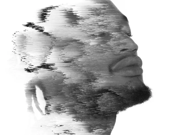 Een dubbelportret van een man gecombineerd met digitale kunst. — Stockfoto