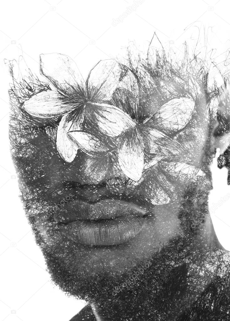 A portrait of a man combined with an ink painting of flowers. Paintography.