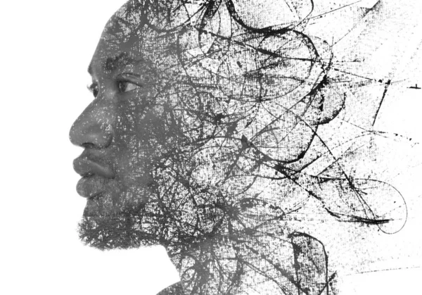 Ein Porträt eines jungen Mannes kombiniert mit schwarzen Tuschestreifen. Malerei. — Stockfoto