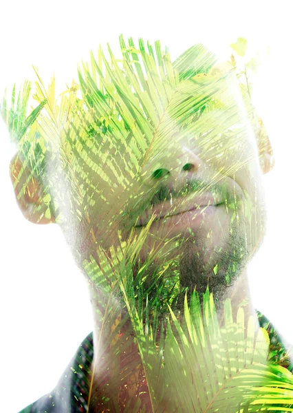 Palm Leaves Forming Portrait Smiling Man — Stock fotografie