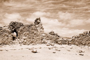 Ruins of ancient fortress Massada. Sepia clipart