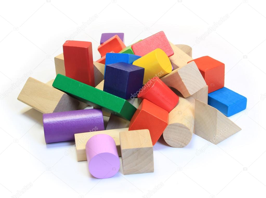 Stack of colorful wooden building blocks on a white background