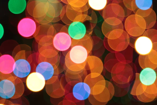 Renkli Noel ışıkları bokeh arka plan — Zdjęcie stockowe