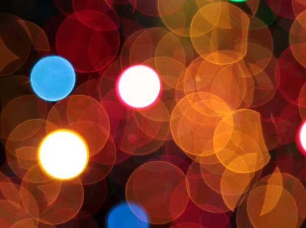 Colourful christmas lights bokeh background — Stock Photo, Image