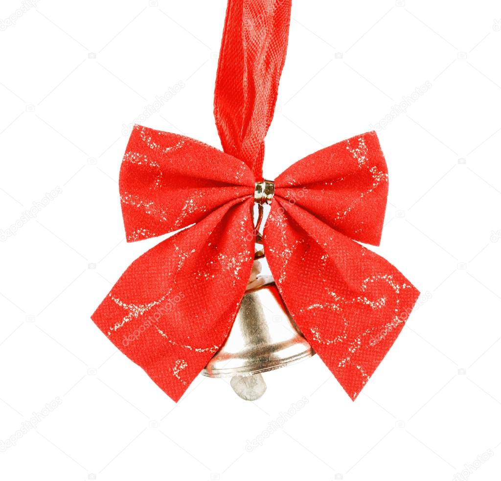 Shiny golden Christmas bell decorated with red bow - isolated on white background