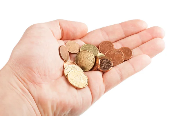 Mão com moedas isoladas sobre fundo branco — Fotografia de Stock