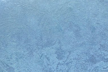 Dokulu mavi arkaplan. Dekoratif alçı duvarlar, duvar kağıtları. Mavi kış dokusu