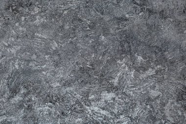 Koyu arkaplan. Dekoratif alçı duvarlar, duvar kağıtları. Siyah desenli dekoratif duvarlar.