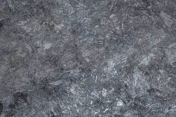 Koyu arkaplan. Dekoratif alçı duvarlar, duvar kağıtları. Siyah desenli dekoratif duvarlar.