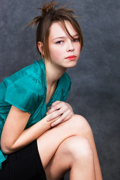 Girl in turquoise blouse — Stock Photo, Image