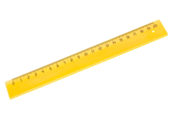 Yellow plastic ruler — Stock Photo, Image