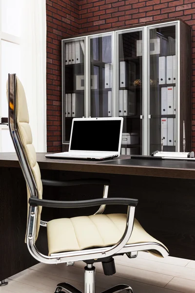 Laptop on a desk — Stock Photo, Image