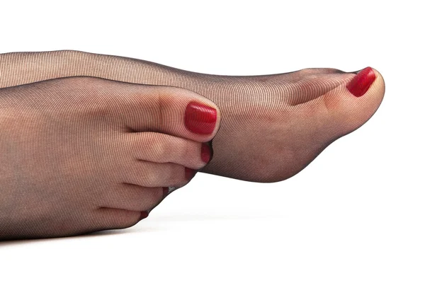 Piedi femminili in calze — Foto Stock