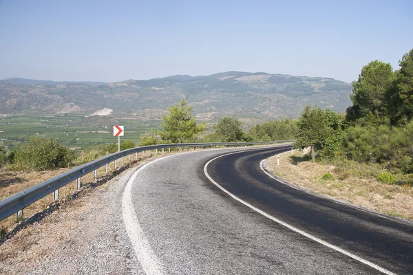 Mountain road with dangerous curves — Stock Photo, Image