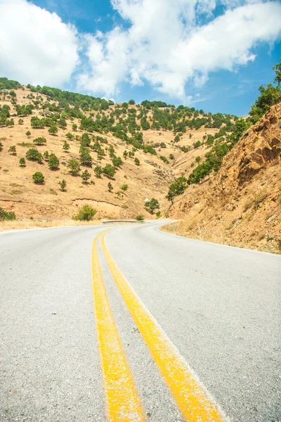 Road in mountain range at Olympos Mountains — Stock Photo, Image