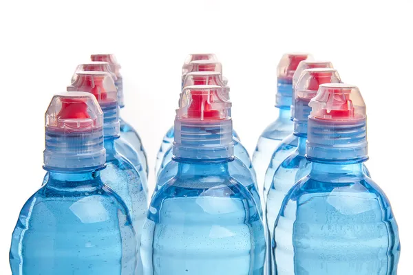 Garrafa de plástico de água potável isolada em branco — Fotografia de Stock