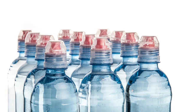 Plastic bottle of drinking water isolated on white — Stock Photo, Image