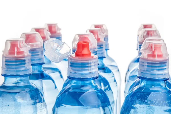 Plastic bottle of drinking water isolated on white — Stock Photo, Image