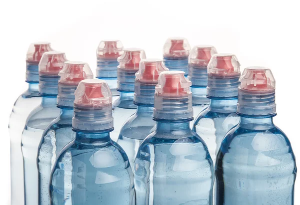 Botella de plástico de agua potable aislada en blanco — Foto de Stock