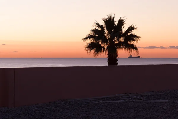 Coucher de soleil sur la plage de Malaga — Photo