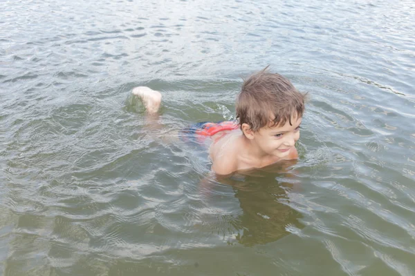 Child playing in the water Royalty Free Stock Images