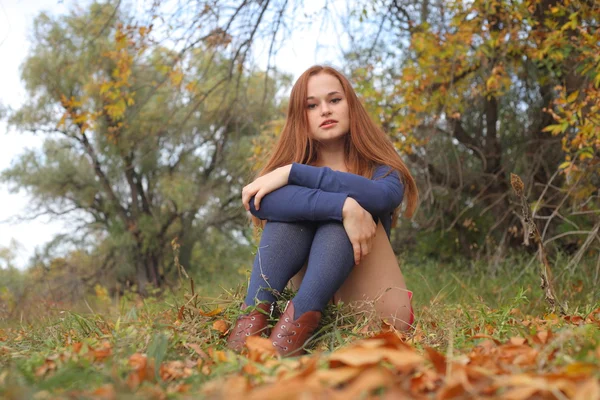 Happy young woman outdoors in the field — Stock Photo, Image