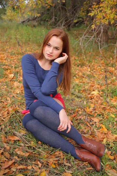 Beautiful girl relaxing in a magic garden — Stock Photo, Image