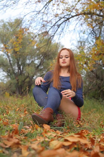 Happy young woman outdoors in the field — Stock Photo, Image