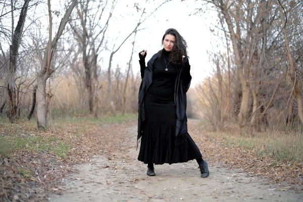 Gothic girl in park next to tree gothic girl in park next to tree — Stock Photo, Image