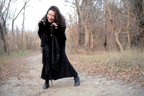 Gothic girl in park next to tree gothic girl in park next to tree — Stock Photo, Image