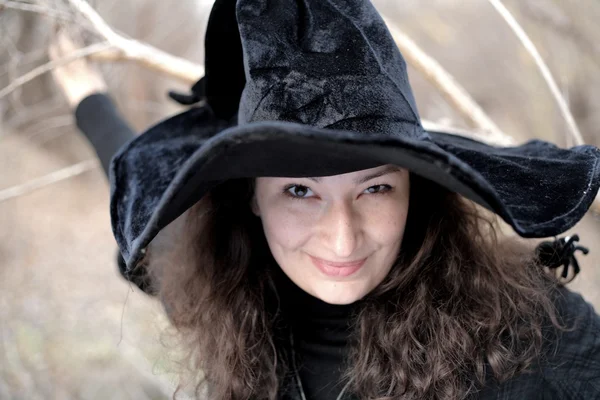 Lady in black witch hat headshot closeup Stock Photo