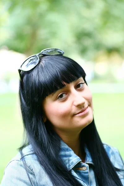 Fresh Faced Girl With Green Background Stock Image