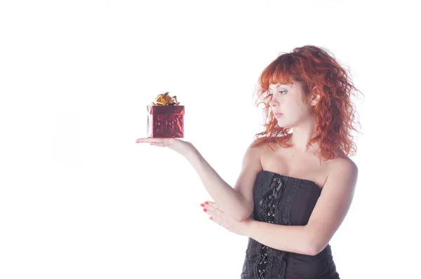 Pretty red haired girl with giftbox — Stock Photo, Image