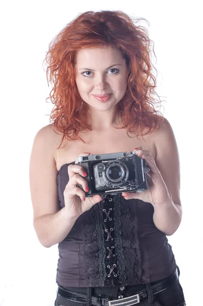 Piękna kobieta z aparatu — Zdjęcie stockowe