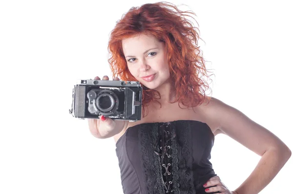 Beautiful female with camera — Stock Photo, Image