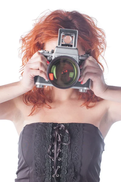 Красивая женщина с камерой — стоковое фото