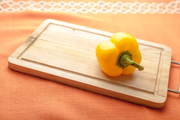 Yellow pepper on a Wooden Background — Stock Photo, Image