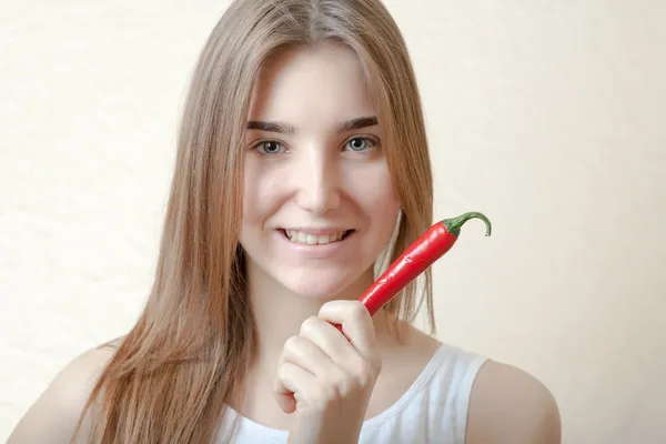 Blond with red pepper — Stock Photo, Image