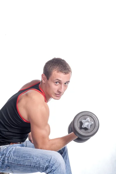 Mann trainiert mit Hantel auf weißem Untergrund — Stockfoto