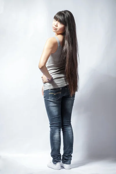 Back view of standing young beautiful Asian woman — Stock Photo, Image