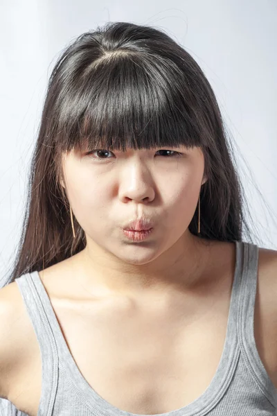 Woman face with copy space headshot making face — Stock Photo, Image