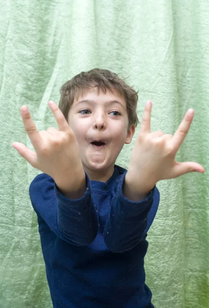 Little boy making faces — Stock Photo, Image