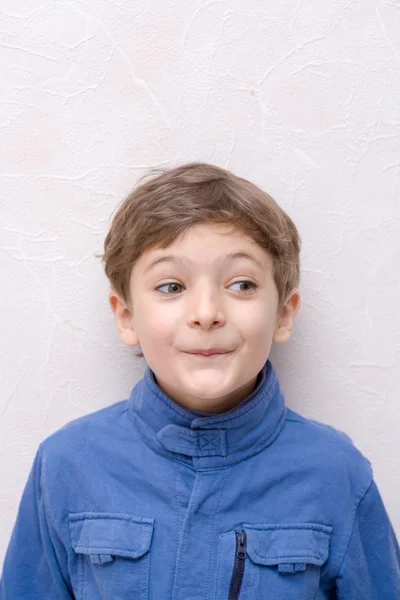 Little boy making faces — Stock Photo, Image