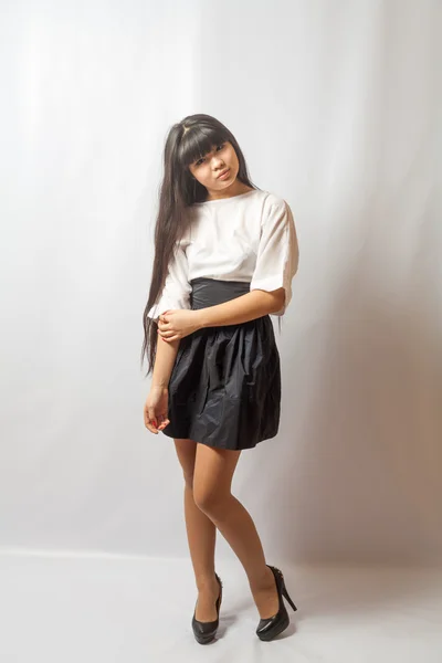 Young woman black skirt. Portrait of asian woman. — Stock Photo, Image