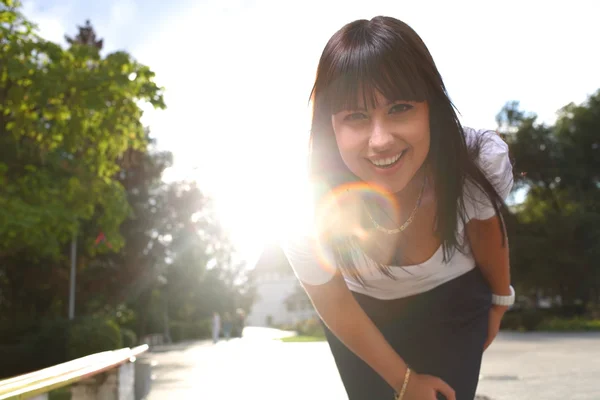 Young adorable woman closeup backlit — Stock Photo, Image