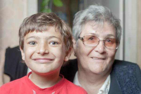 Portrait of a senior woman and grandson — Stock Photo, Image