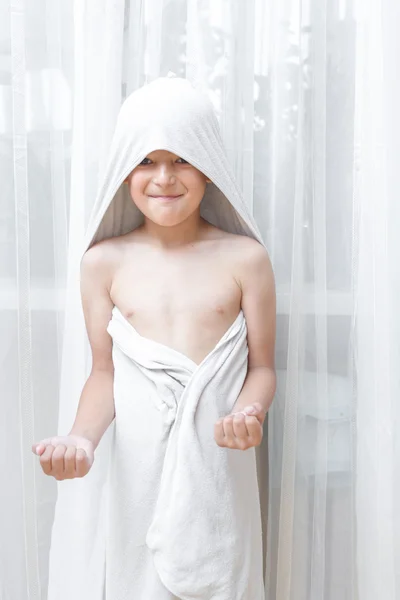 Smiling little boy in towel — Stock Photo, Image