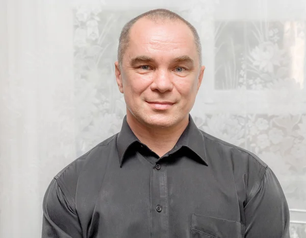 Orta yaşlı bir adamın portresi