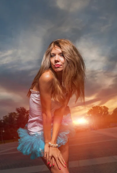 Long haired blonde outdoor weared tutu skirt costume — Stock Photo, Image