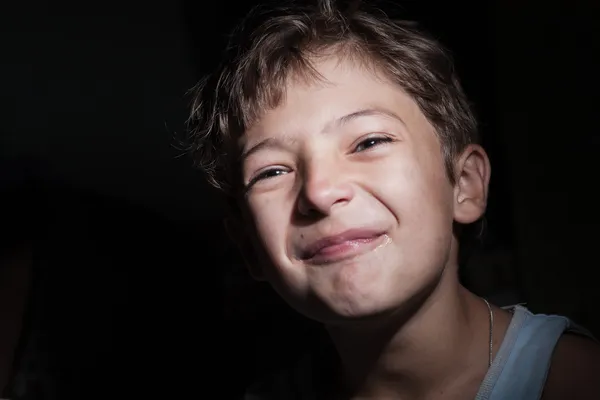 Sad boy in the dark, headshot — Stock Photo, Image